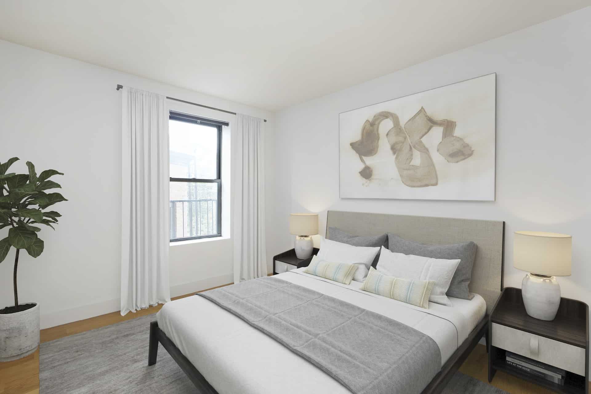 Bedroom at 457 15th Street apartments in Brooklyn with a queen size bed, matching side tables, a window and hardwood floors.